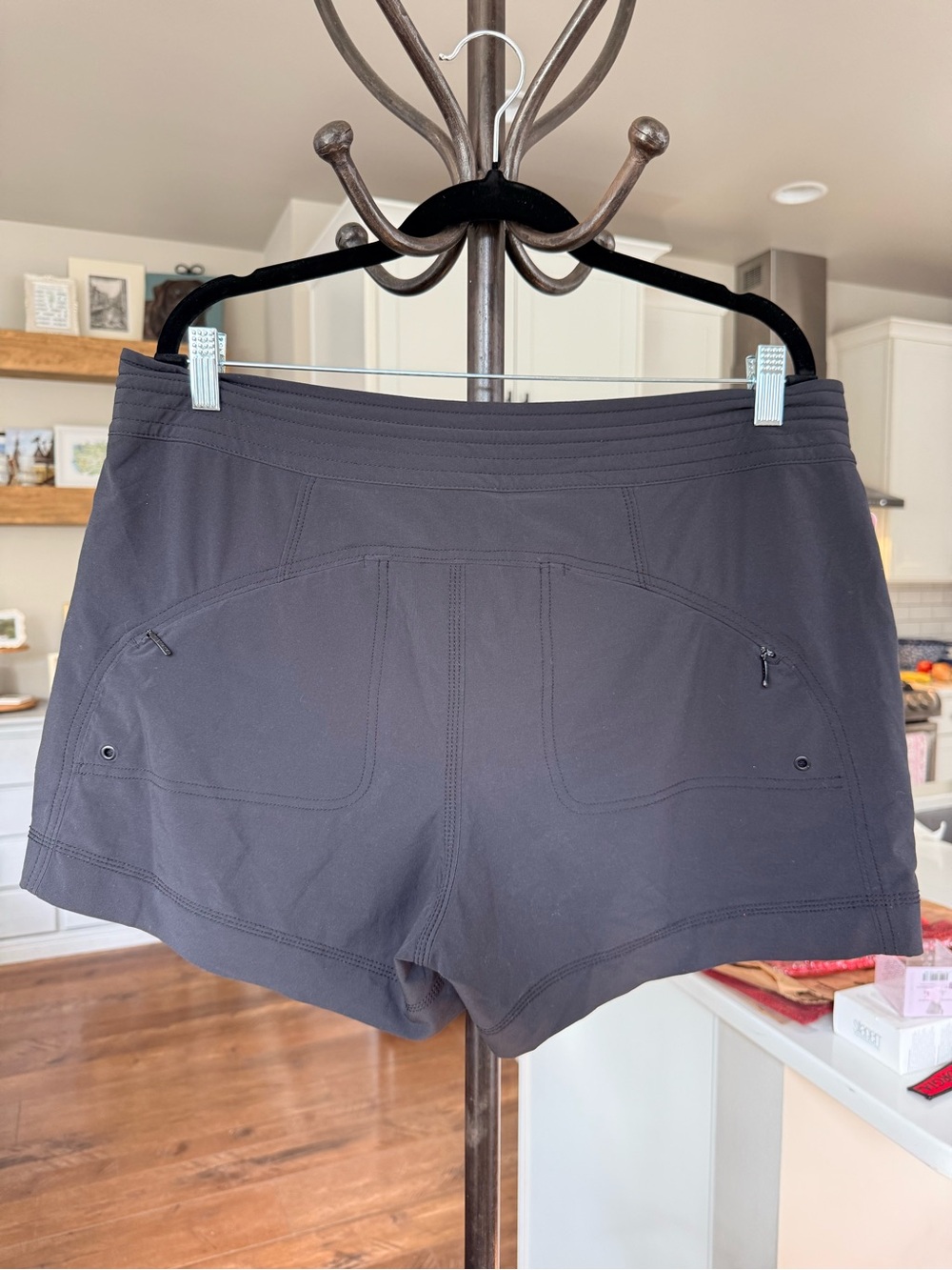 Women’s ATHLETA Black snap button with a drawstring Performance Shorts - Picture 2 of 3